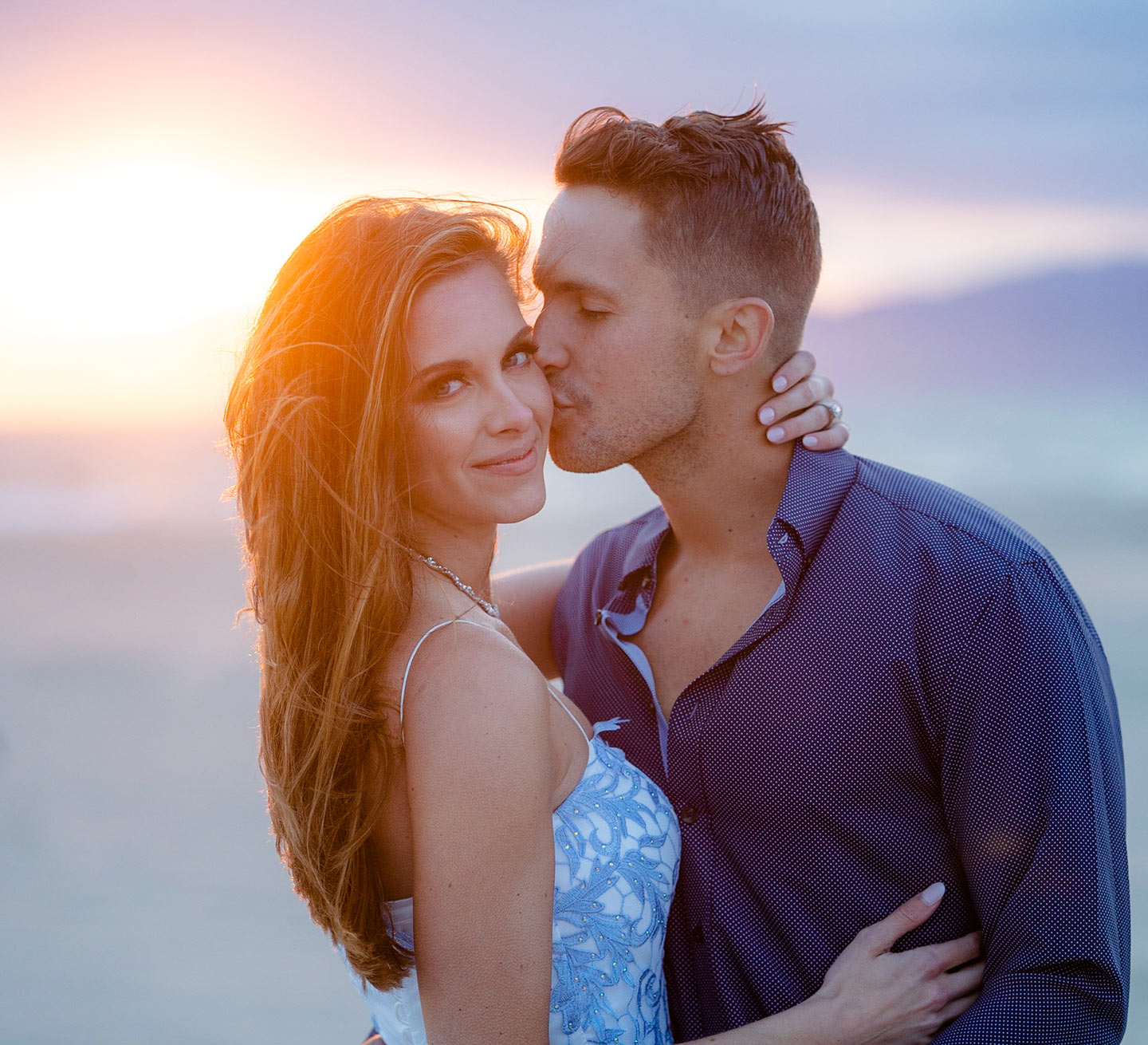 Newly Engaged Couple Kissing